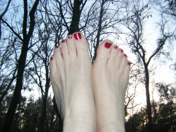 My too-pale feet with their beautiful painted toenails emerged from their shoes to become one with the winter sky... just to illustrate how silly a pedicure in winter could be, except for the lessons it teaches...