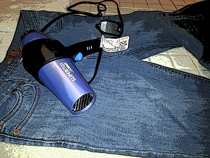 Photo illustration because clearly this is not the black blow dryer we share nor is it the jeans we do not share.