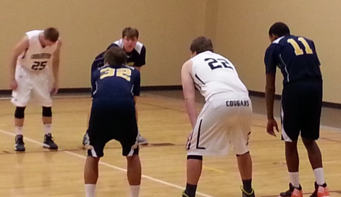 One of the reasons I have less time... the privilege of watching my son play varsity basketball his senior year. (He wears #22.)