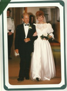 My dad walked me down the aisle and gave me away, despite my bird's nest hairdo. 