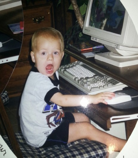 young adam on computer
