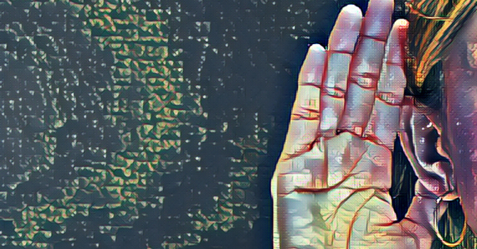 a woman cups her hand to her ear to hear better