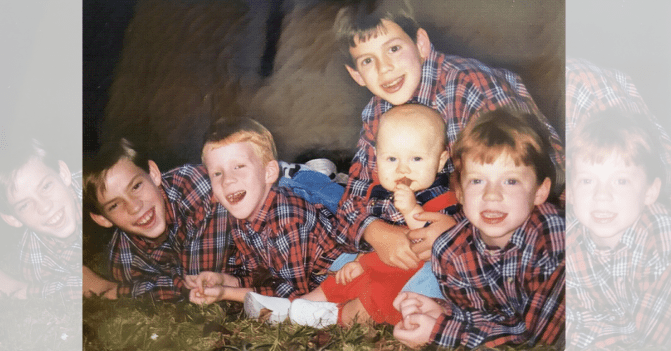 five children -- one a baby -- wearing matching flannel shirts